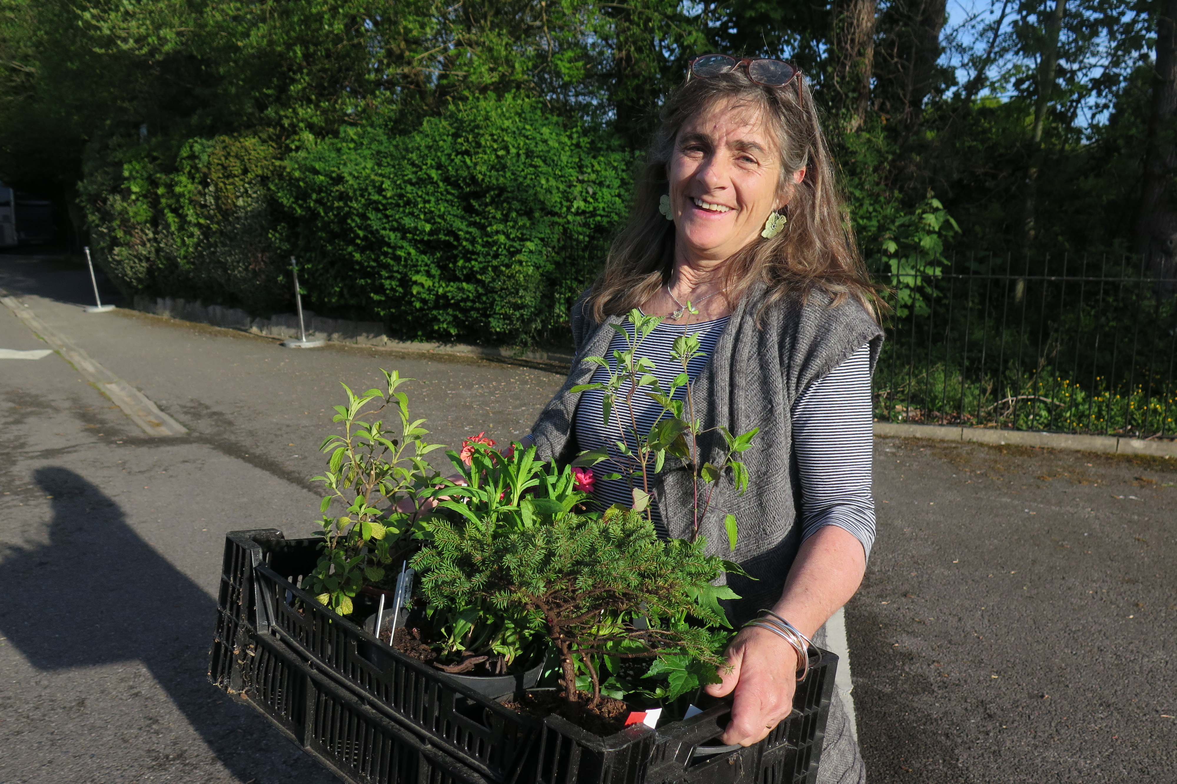 Lucy bringing plants into the Exchange